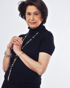 NEERA G.