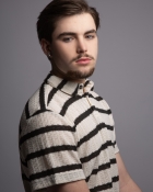 DANIEL J.