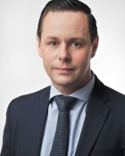 VAUGHN M.