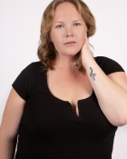 CAROLYN B.