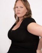 CAROLYN B.