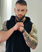 MARK B.