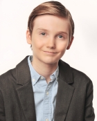 WILLIAM B.